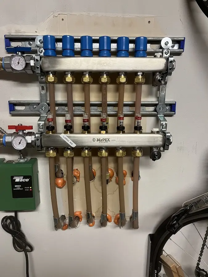 Plumber performing Gas Leak Detection at a residential property in New Philadelphia